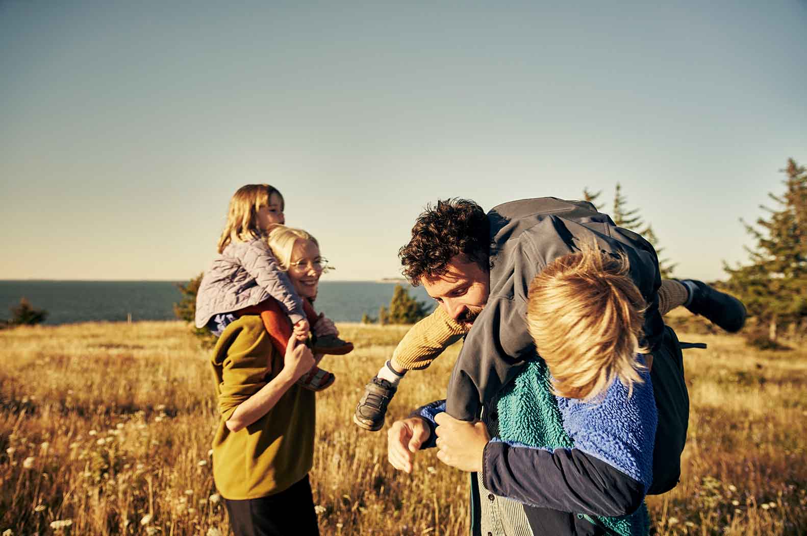 GCR-Family_happy_in field_sun